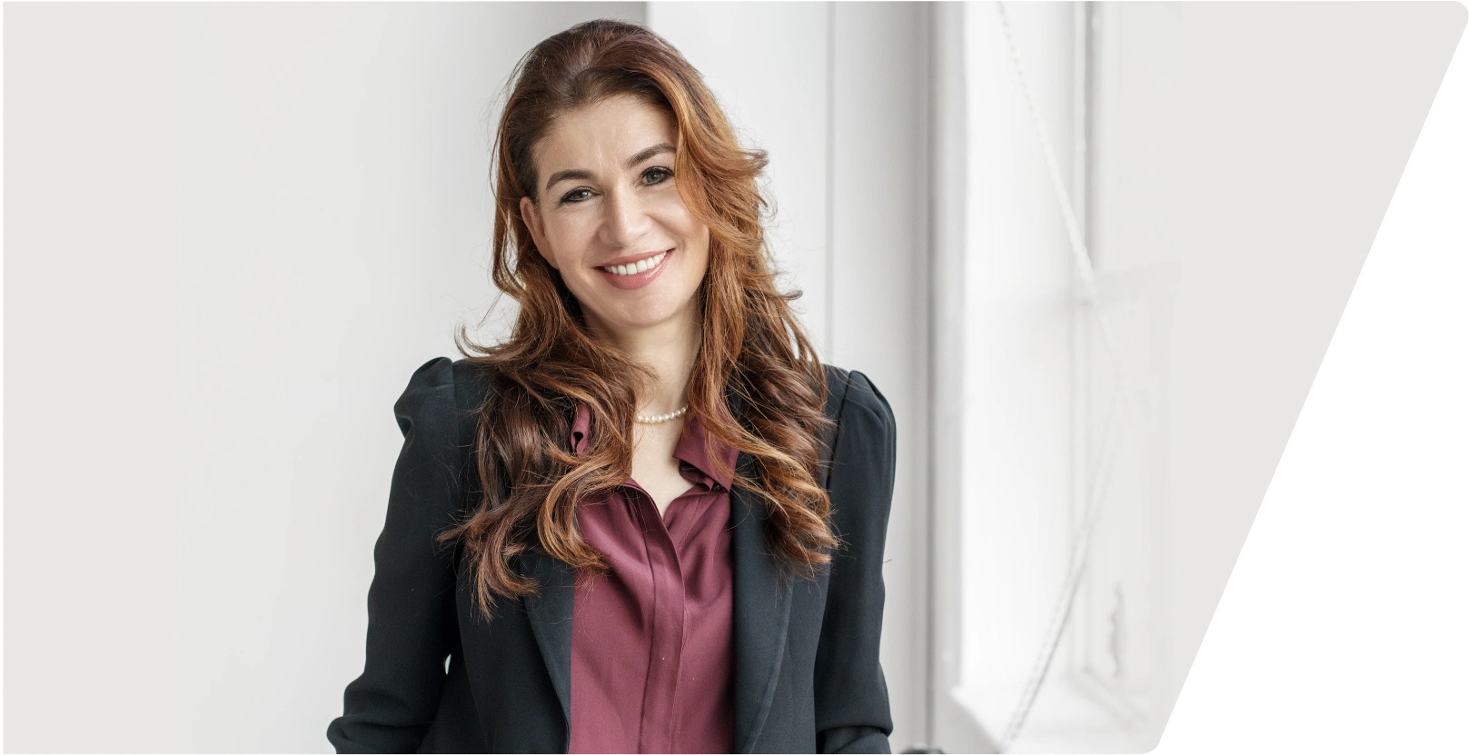 DR. REENA CLARKSON Orthodontist