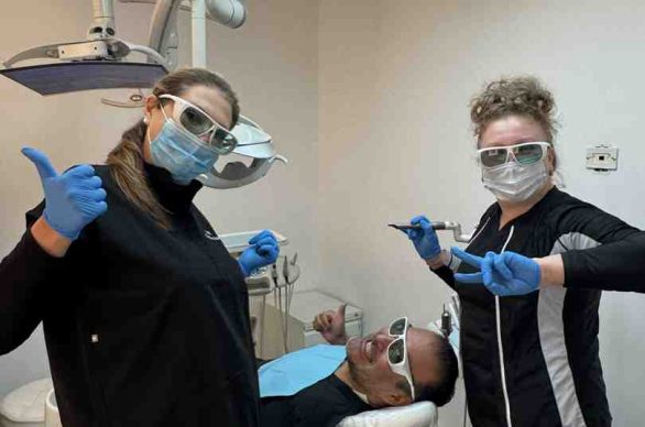 same day dental implants New York patient smiling